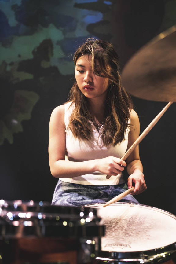 A girl drumming