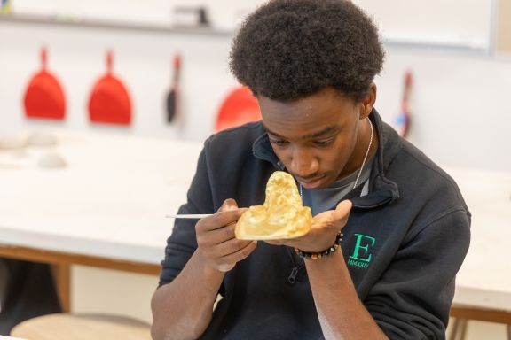 boarding school student creating a lovely piece of art
