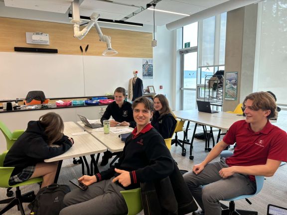 Private school students learning anatomy