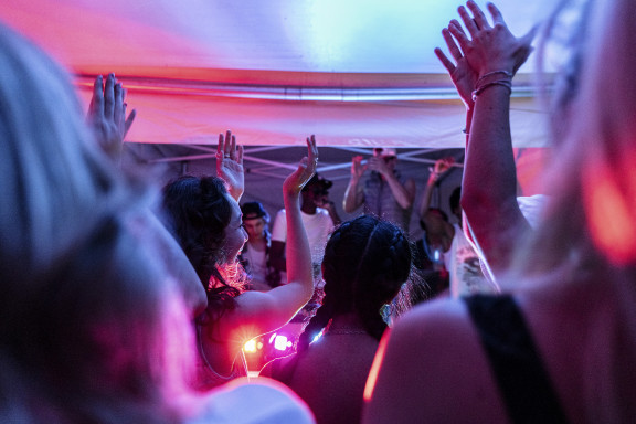 Boarding school students dancing at an open house