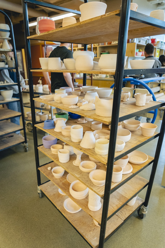 A full rack of drying pots
