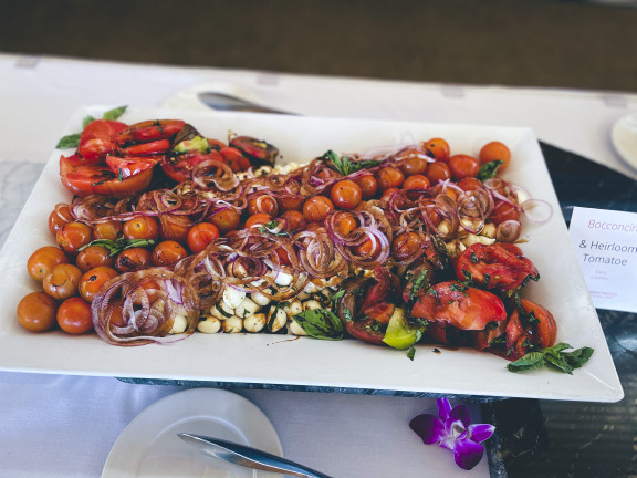 A plate of tomatoes and basil salad