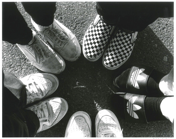 A photo of a group of student's shoes