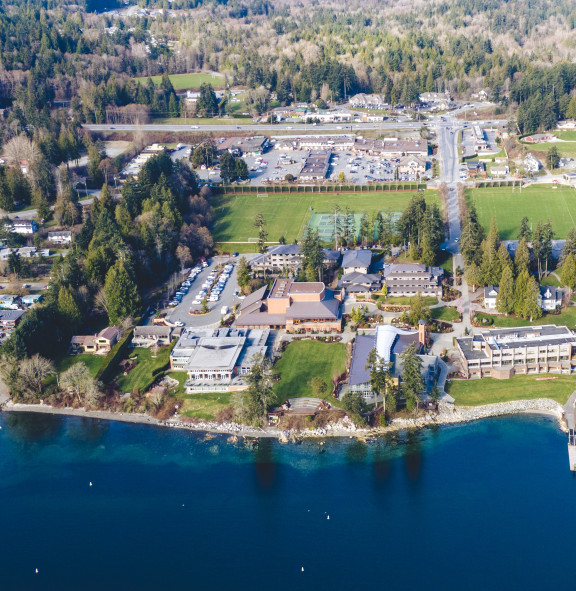 An aerial view of the campus and the town of Mill Bay