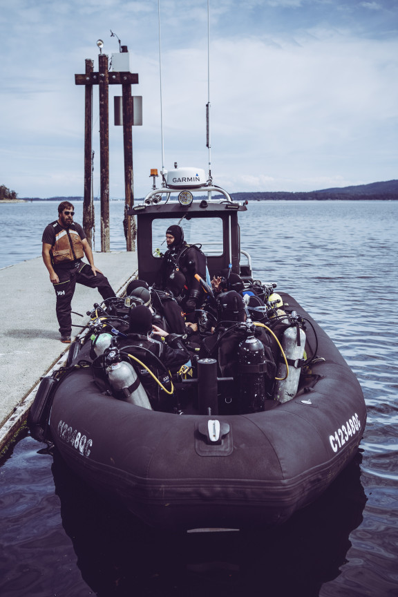 The SCUBA team in a boat ready to head out to sea