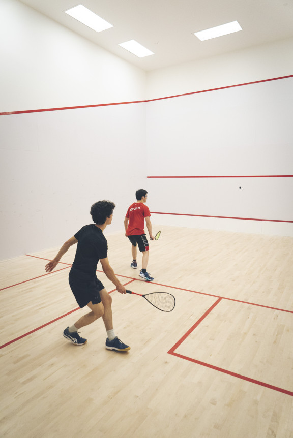 Two players in a squash match