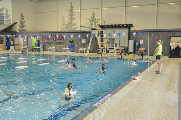 A group of students having fun in the pool