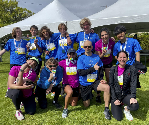 A race team after completing a half marathon event