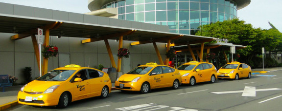 A group of taxis on the street