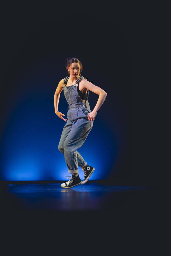 A hip hop student performing
