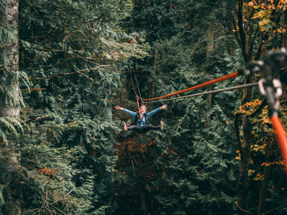 A student on a zip line