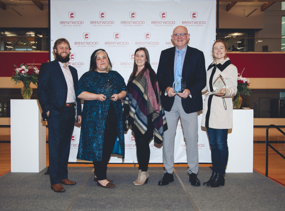 A group of Brentonian award winners on stage