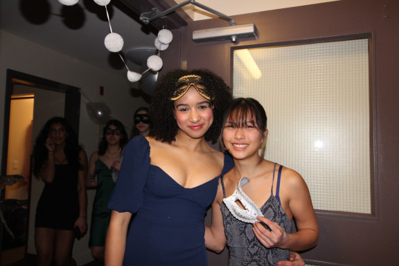 Private school students with masks dressed up for an open house