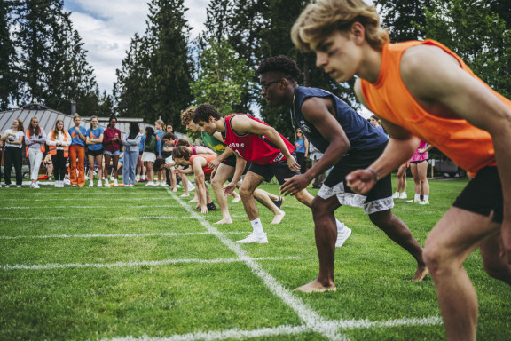 Students at the start line of the 100-metre sprint race