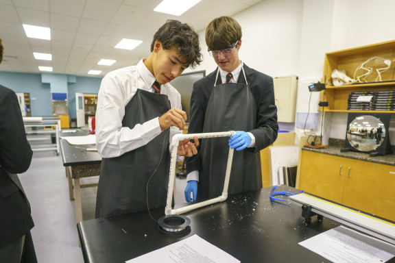 Two students working on a science project