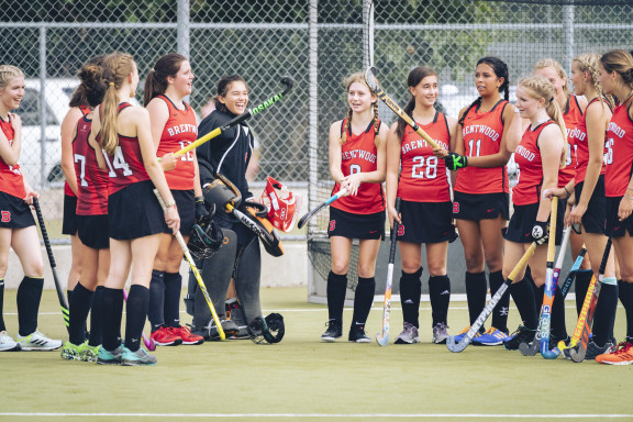 The field hockey team celebrating a win