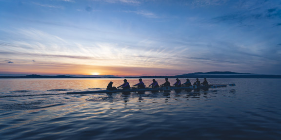 Rowing in the morning sunrise