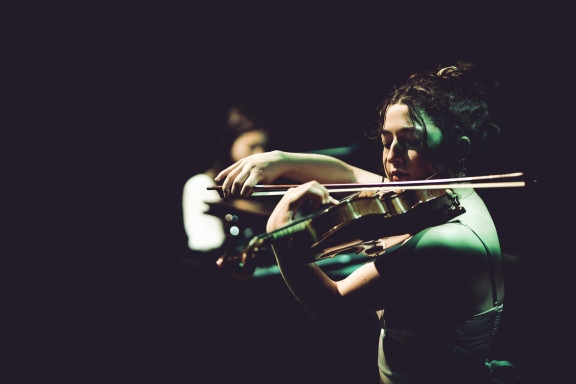 A student playing the violin