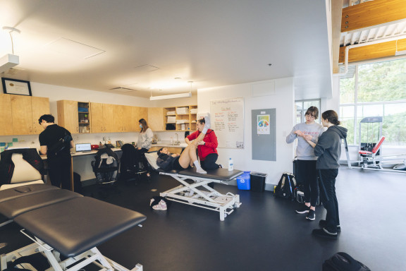 Student athlete receiving athletic therapy care Briggs Health, Wellness & Athletic Therapy Centre