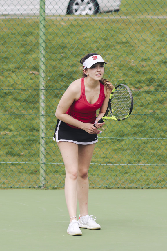 A tennis player ready to receive the serve