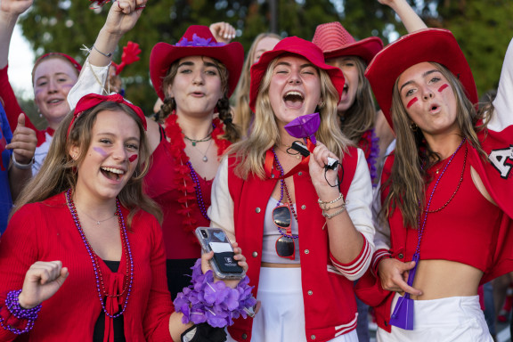 Students cheering at a sporting event