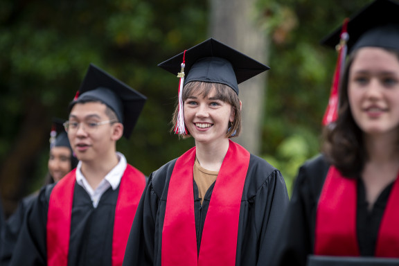 Students smiling during the 2020 graduation ceremony