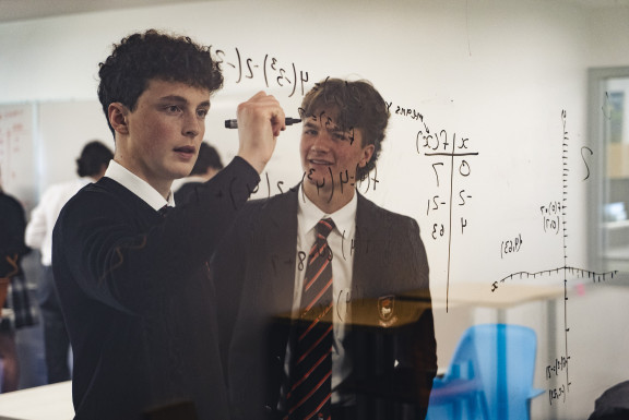 Two students working on Math
