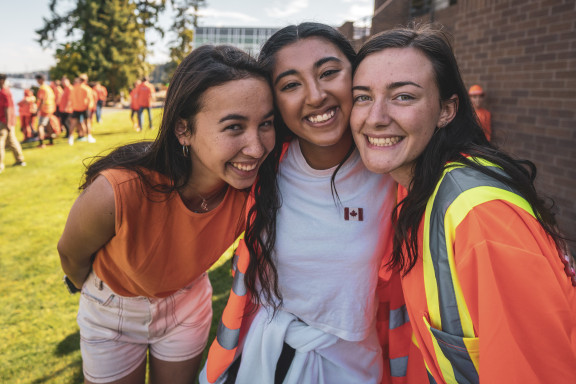 Three girls smiling