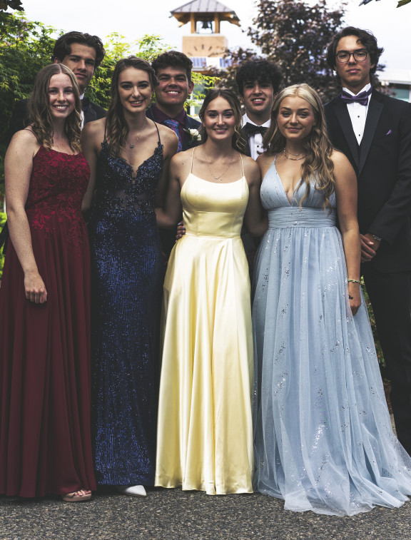 Private school students dressed up for formal dance