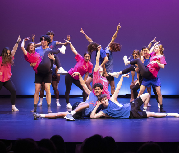 Students dancing on stage during the airbard competition