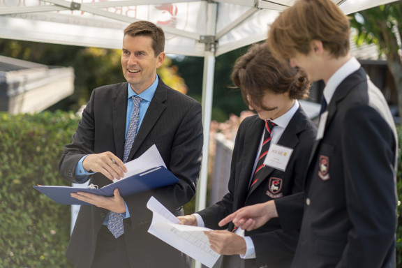 A house parent and students at the start of the school year