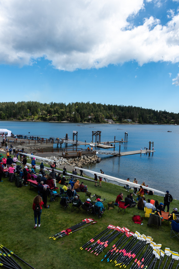 The waterfront with spectators and oars