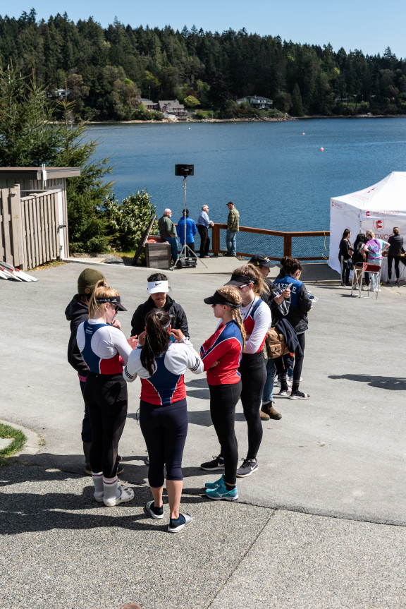 Rowing athletes talking during the regatta