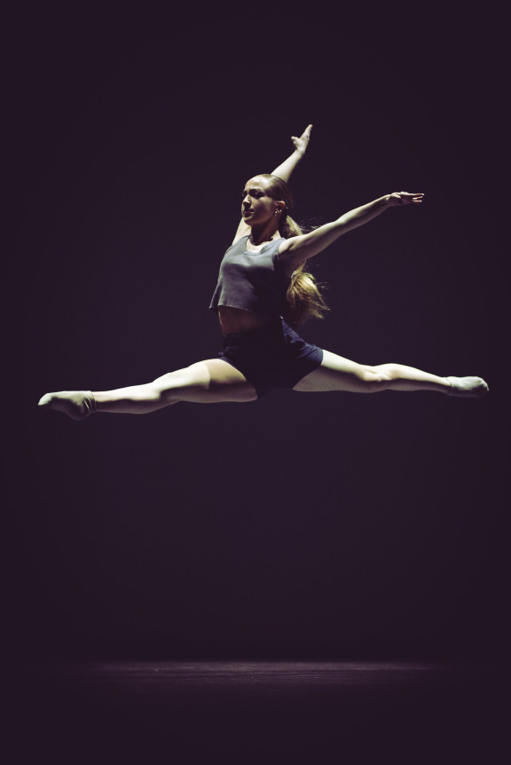 A dancer jumping in the air