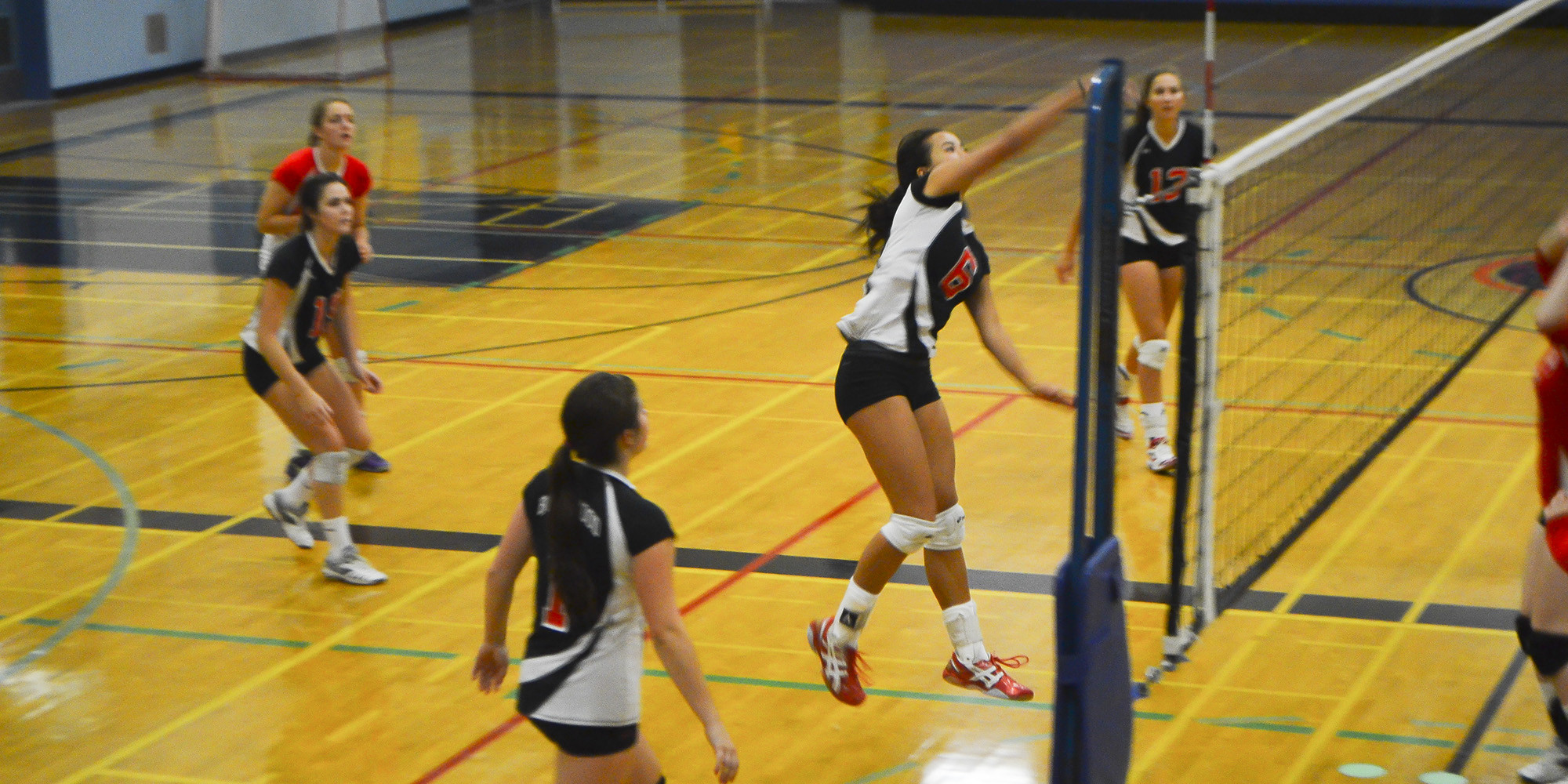 Senior A Volleyball Splits Season Opener
