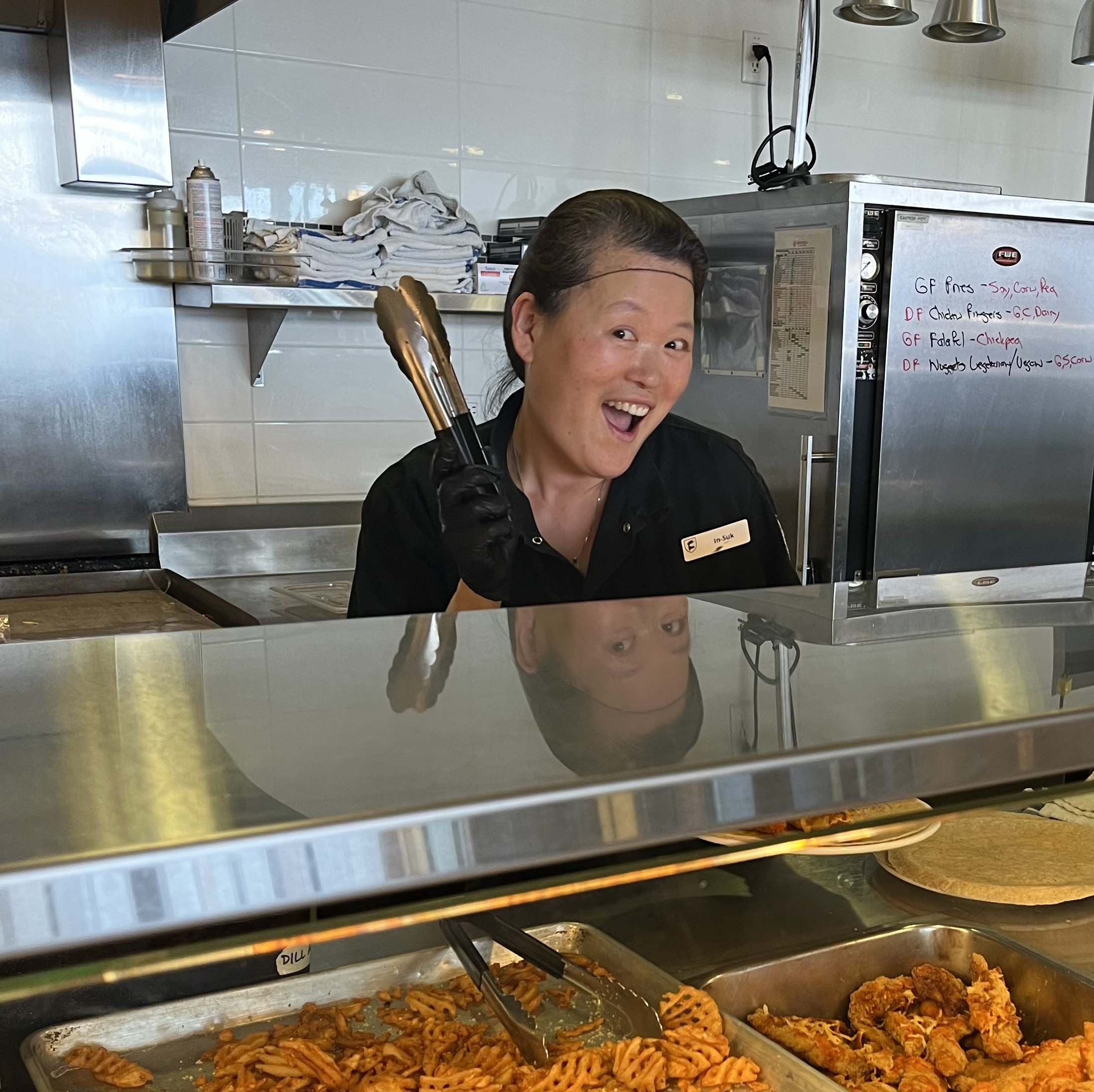 Food Services Staff Serve Food with Joy