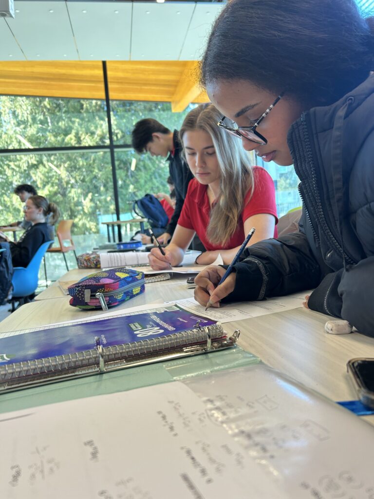 Boarding school students learning Pre-Calculus 12