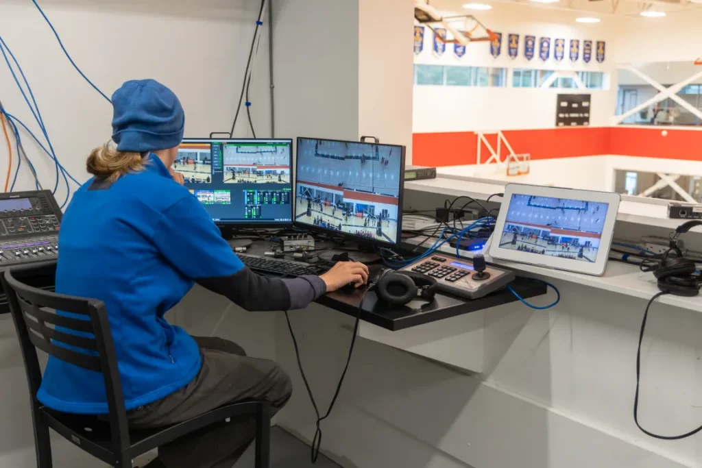 A student running the broadcast control desk at a Brentwood event