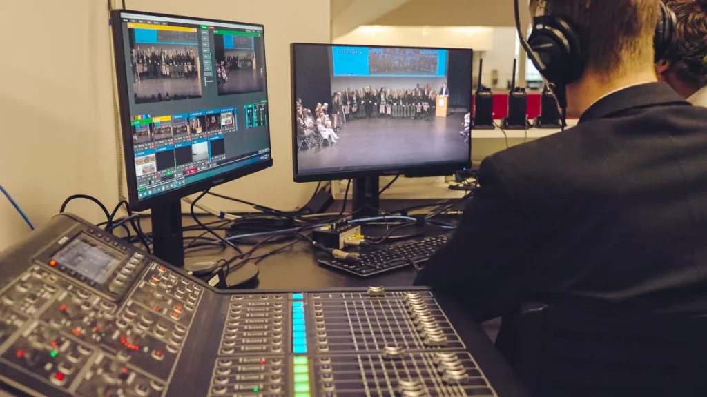 Monitors and a mixer in the livestreaming booth in the Foote Centre