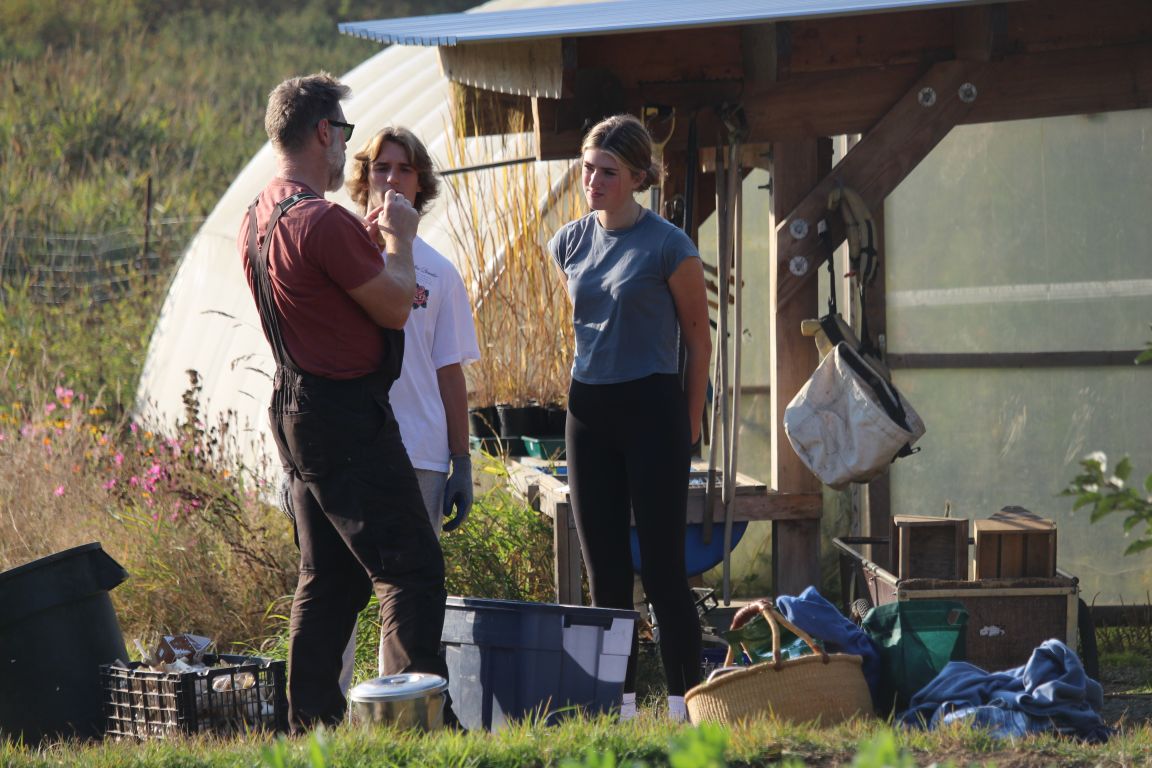 Students learn from local farmer about ecological responsibility