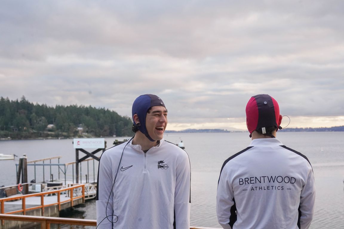 Two student athletes wearing neuroscience brain monitors