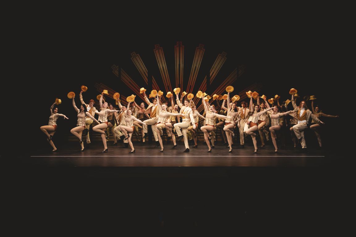 Students performing on stage