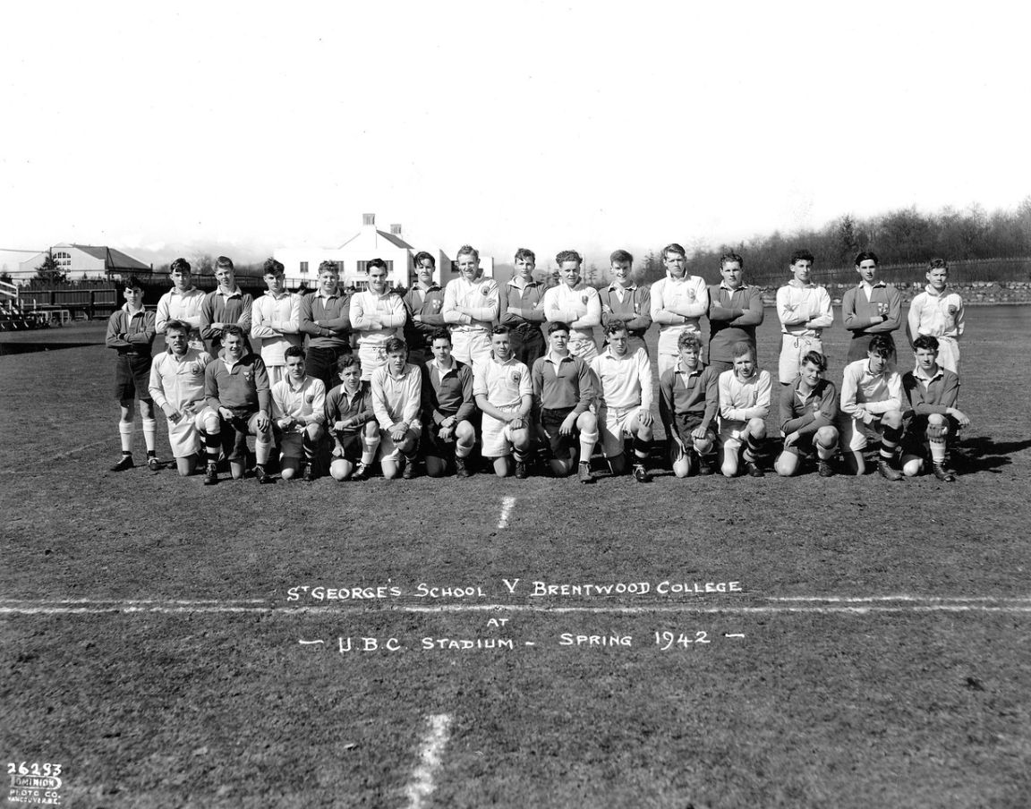 Black-and-white 1942 team photo of Brentwood's rugby team at UBC Stadium