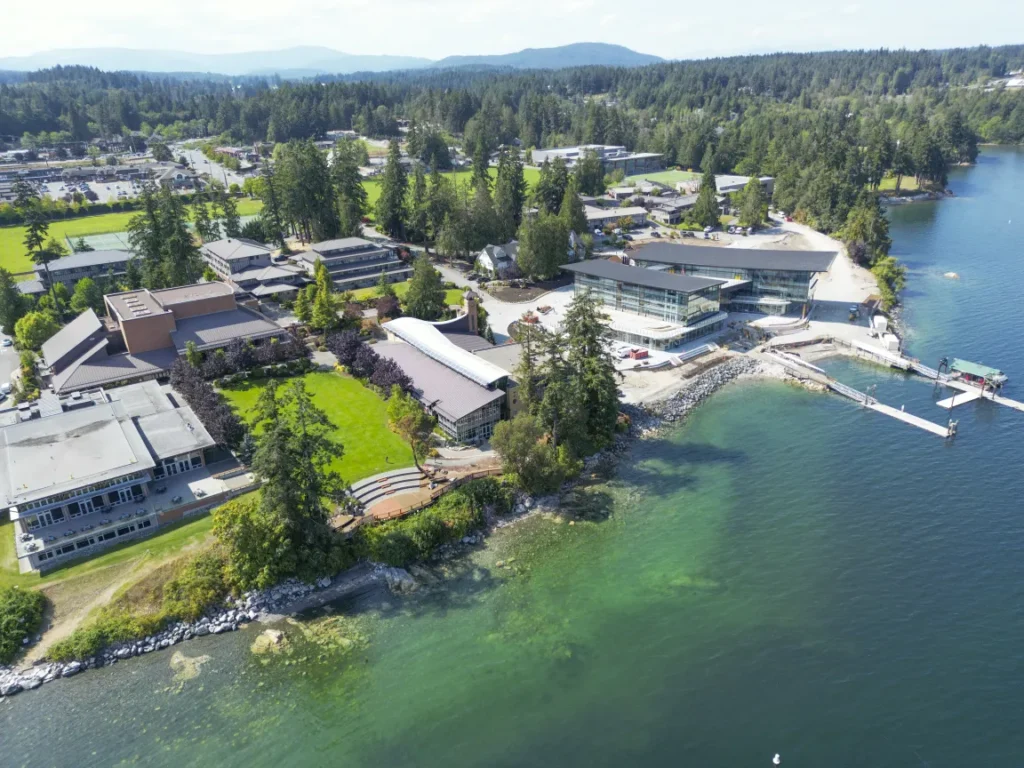 Campus as seen from the south with dining hall and arts building nearest, new academic centre beyond