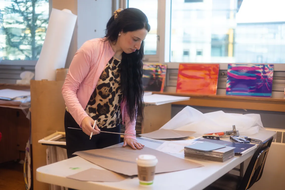 Brentwood art teacherworking in sunlit studios on campus