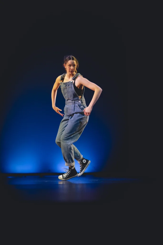 A hip hop student performing