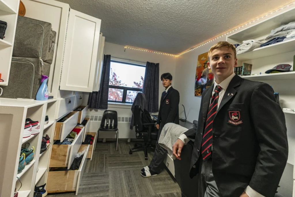 Boarding School boys in their dorm room during a weekly inspection