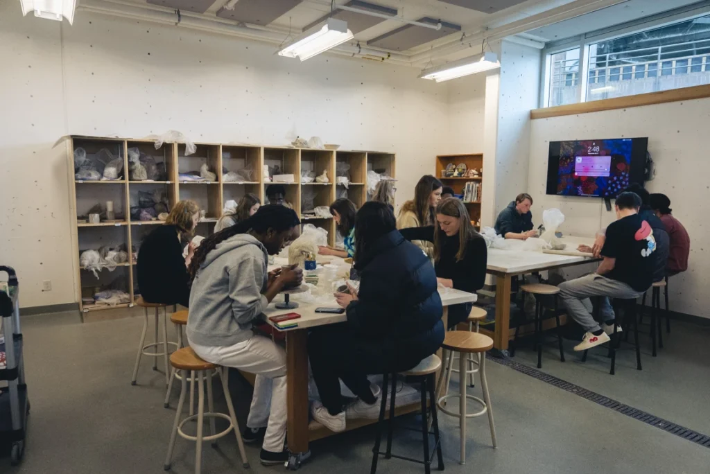 Students working at tables in Brentwood's ceramics studio