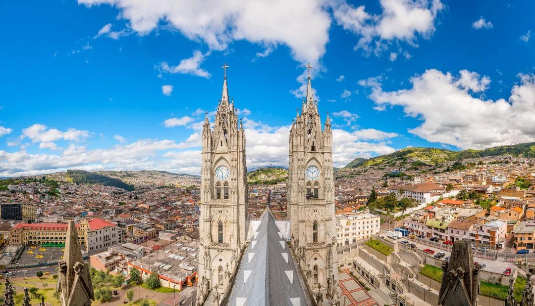View from Quito's basilica towers over the city skyline and Andes mountains, Ecuador