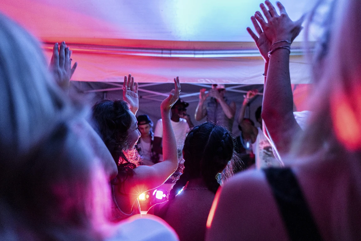 Boarding school students dancing at an open house